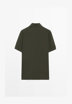 Dark green short-sleeve polo shirt shown from the back with a flat collar and plain design on a white background.