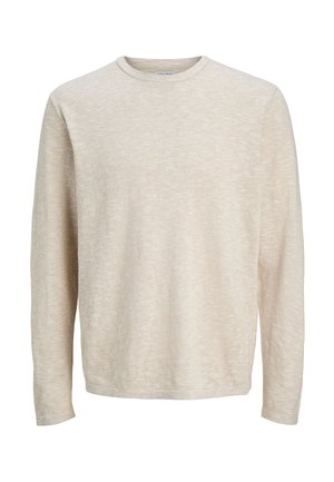 Helebeežikas beež pikkade varrukatega ümarsõlme kampsun, millel on pehme kootud tekstuur ja lõdvestunud lõige.