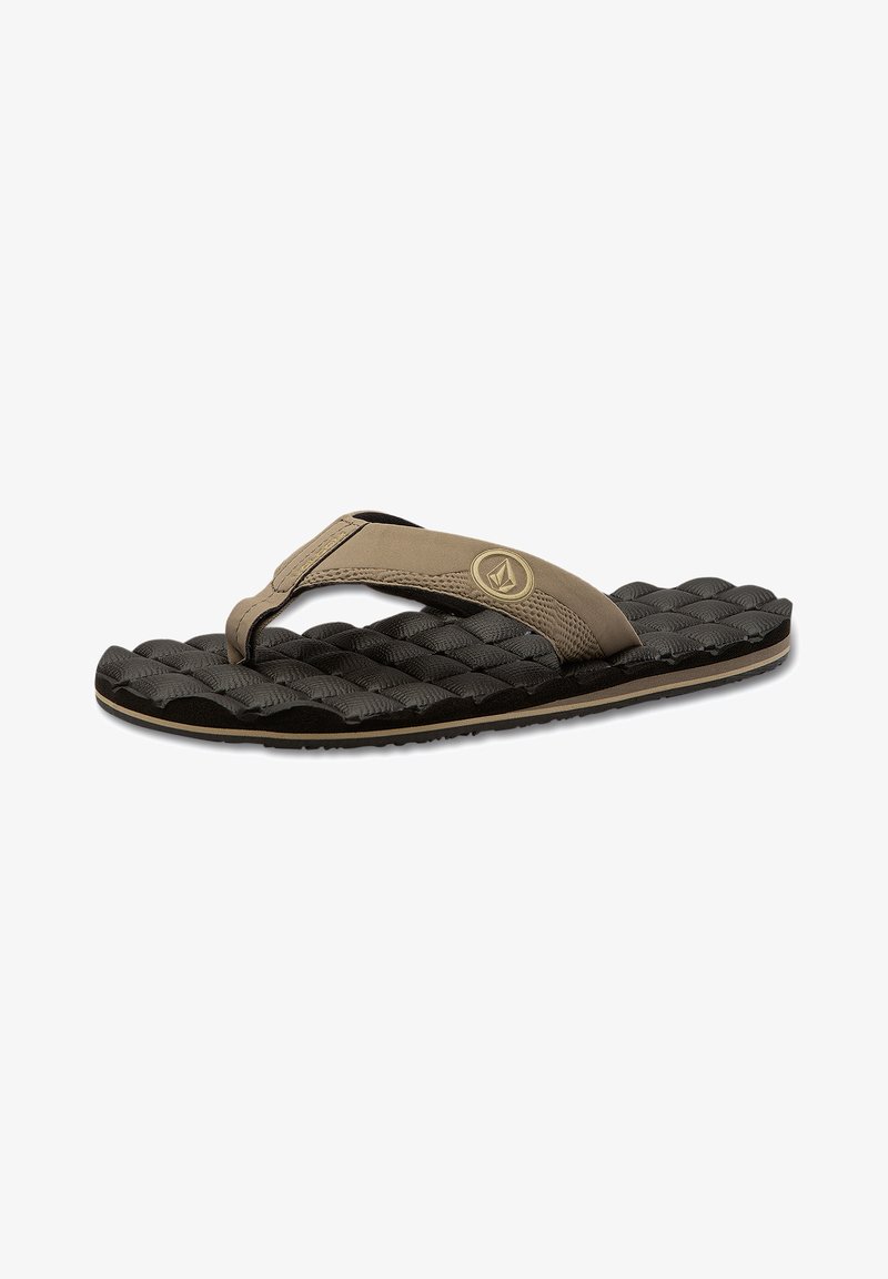 Brown flip-flop with a textured black rubber sole, featuring a padded thong strap and a circular logo accent on the side.