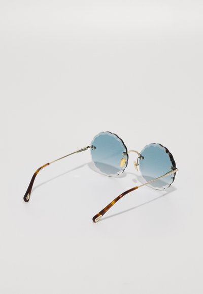 CHLOÉ ROSIE RIMLESS ROUNDED METAL SUNGLASSES - Óculos de sol - gold-coloured/blue