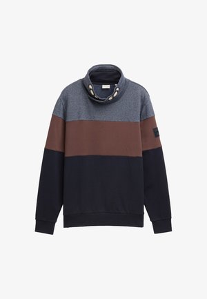 Bluza cu blocuri de culoare, cu secțiuni în albastru închis, maro și gri deschis, guler înalt cu accente de nasturi și manșete și tiv răsucite.