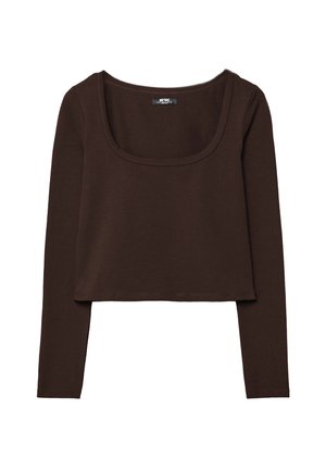 Smešasti dugih rukava smeđi crop top s okruglim izrezom, napravljen od mekog, rastezljivog materijala. Ima jednostavan, minimalistički dizajn i ravni rub.