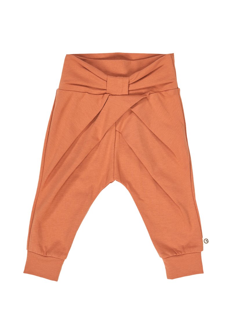 Lichtoranje peuterpantalon van zachte stof, met een crossover-ontwerp in de taille en taps toelopende boorden bij de enkel.