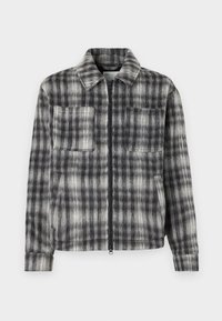 Gray and black plaid jacket with a zip front, two chest pockets, and a soft, textured fabric. Features a collared neckline and long sleeves.
