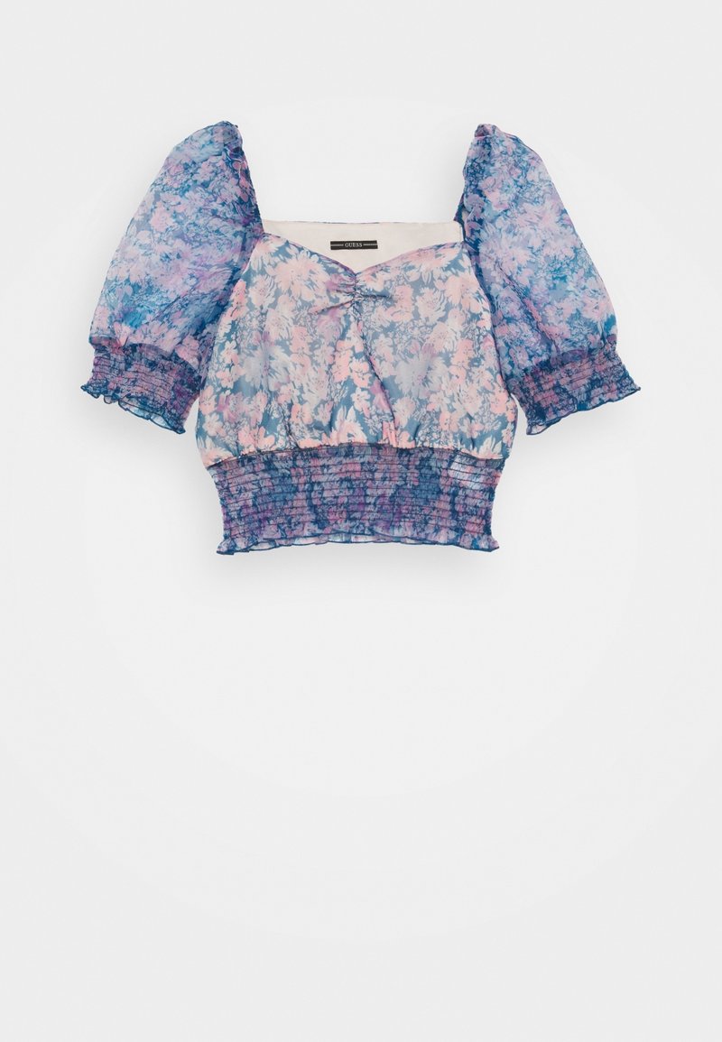 Blouse courte à motif floral avec manches bouffantes et taille smockée dans des tons de bleu et de rose.