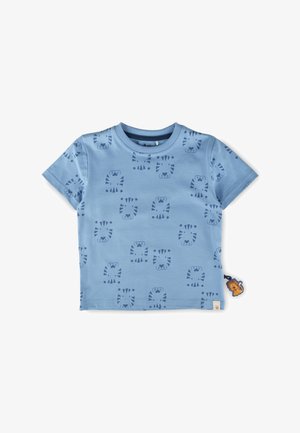 T-shirt bleu clair pour tout-petit avec motif de visage de tigre bleu marine et une petite étiquette lion sur la couture latérale.