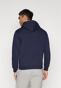 Champion ICONS HOODED SMALL LOGO - Jersey con capucha - dark blue