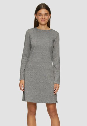 Robe à manches longues à carreaux gris, coupe droite, col rond et motif texturé subtil. Présente des fentes latérales pour plus de liberté de mouvement.