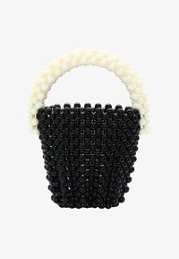 Kijelölve, schwarz wollweiss