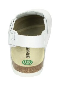 Sabots blancs avec une sangle ajustable, semelle en liège et doublure intérieure beige. Design de logo notable visible sur la semelle intérieure.