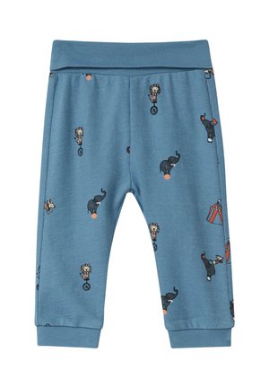 Blauwe katoen sweatpants met circus-thema prints van dieren en artiesten; geribde tailleband en boorden, zachte textuur.