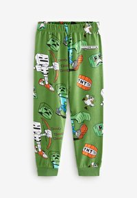 Pantalons de pyjama verts avec des personnages de Minecraft, taille élastique et poignets côtelés. Motifs audacieux et colorés avec des graphismes de creepers et de TNT.