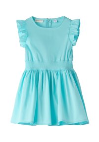 Helles blaues Kleid aus glattem Stoff, mit kurzen Rüschensäumen, einer gesmokten Taille und einem ausgestellten Rock. Reißverschlussverschluss hinten.