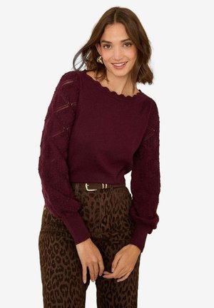 - Sweter