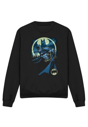 Schwarzer Sweatshirt mit einer Grafik von Batman vor einem leuchtenden Bat-Signal und der Skyline von Gotham bei Nacht.