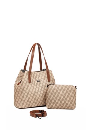 Beige patterned tote bag with brown leather handles, accompanied by a matching smaller pouch and adjustable strap. Textured surface throughout.