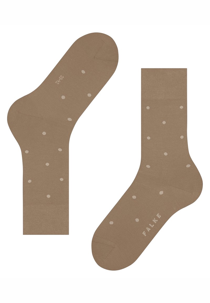 Κρεμ κάλτσες με απαλό υφή και κανονικά τοποθετημένες ανοιχτόχρωμες βούλες. Περιλαμβάνουν ενισχυμένες μύτες και άνετη ριπτή μπάσα.