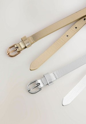 Two belts; one gold with a rose gold buckle, the other silver with a silver buckle. Both have a smooth, shiny texture and pointed ends.