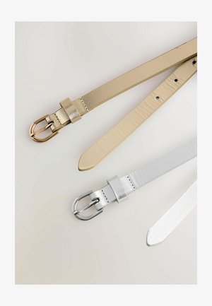 Two belts; one gold with a rose gold buckle, the other silver with a silver buckle. Both have a smooth, shiny texture and pointed ends.