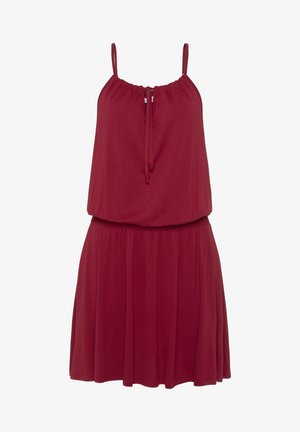 Mouwloze, bordeauxrode jurk gemaakt van zachte stof. Heeft een geplooid lijfje en een elastische taille voor een ontspannen pasvorm. Lichte en vloeiende rok.