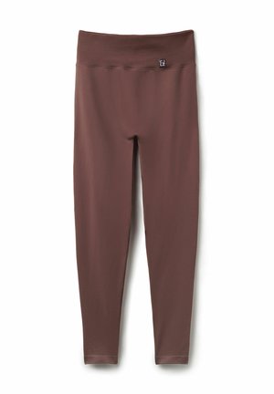 Braune Leggings mit einem breiten, gerippten Bündchen und glatter Oberfläche. Das Design ist eng anliegend, ohne sichtbare Verschlüsse oder Muster.