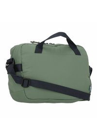 Green soft-sided bag made of durable fabric, featuring a rectangular shape, top handles, and an adjustable navy strap. Zip closure detail visible.
