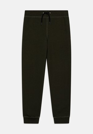 Dunkelgrüne Sweatpants aus weichem Baumwollmaterial, mit einem elastischen Bund und einem Kordelzug sowie enganliegenden Bündchen an den Knöcheln.