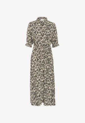 Svart- och vitmönstrad midiklänning med krage, korta puffärmar och ett knytbälte i midjan. Knappstängning fram.