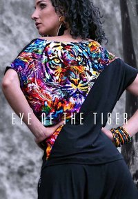 Black short-sleeve top featuring a vibrant tiger graphic in multiple colors on one side, with a smooth texture and relaxed fit design.