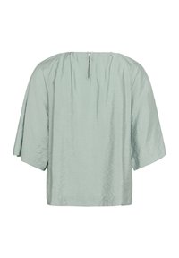 Blusa verde chiaro a maniche corte con una texture plissettata, scollatura rotonda e chiusura a goccia sul retro. Design semplice e squadrato.