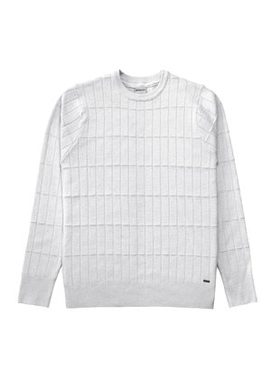 Heledhall hallidega kootud särg, millel on tekstuuriga ruudumuster, ümmargune kaelus ja pikad varrukad. Algel vasakul on väike logo silt.