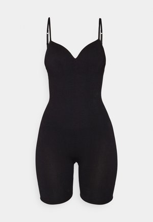 Black bodysuit with a plunging neckline, slim adjustable straps, smooth texture, and a fitted design extending to mid-thigh.