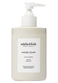 pumpflaska med handtvål; cylindrisk, krämfärgad med en vit pump; etiketten står det "citrus menthe, ekologisk aloe vera, certifierad ekologisk vegansk formel."