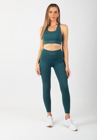 Carlheim Legíny – nohavice - teal green