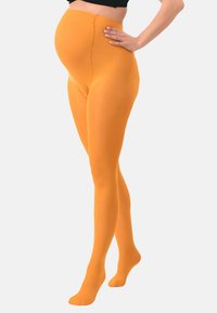 Collant premaman arancioni con una texture liscia e elastica e una vita alta per supporto. Progettato per adattarsi a una pancia in crescita.
