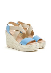Sandalias de cuña en azul y beige con tiras cruzadas, parte superior de tela suave y tacón de cuerda trenzada, con plantilla acolchada y suela texturizada.