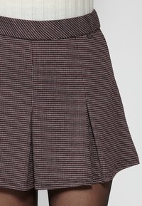 Koroshi Fustă în formă de A - granate   maroon