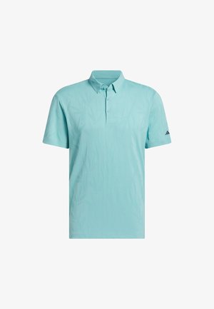 Polo azzurro chiaro realizzato in tessuto liscio, con colletto, patta con tre bottoni e un sottile motivo testurizzato su tutta la superficie.