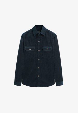 Camicia di corduroy blu scuro con maniche lunghe, colletto a punta e chiusura frontale con bottoni. Presenta due tasche sul petto con patta e dettagli in bottone.