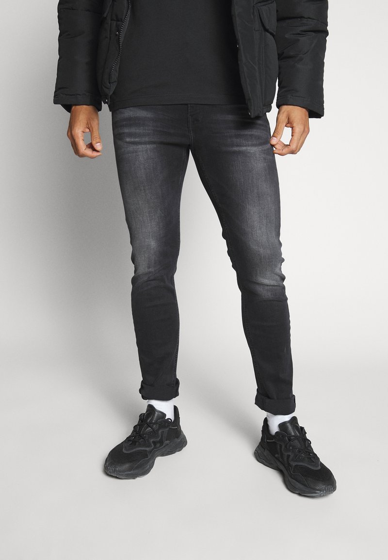 Calvin Klein Jeans SLIM TAPER Jeans Slim Fit black/black denim