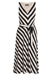 Musta-valkoinen zig-zag-raidallinen hihaton mekko, jossa on V-pääkallokohta, vyötärölle sidottu vyö ja virtaava helma, valmistettu sileästä kankaasta.