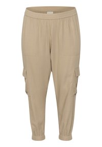 Beige cargobyxor med elastisk midja, två framfickor och smalnande muddar. Tillverkade av lättviktigt tyg och har en avslappnad passform.