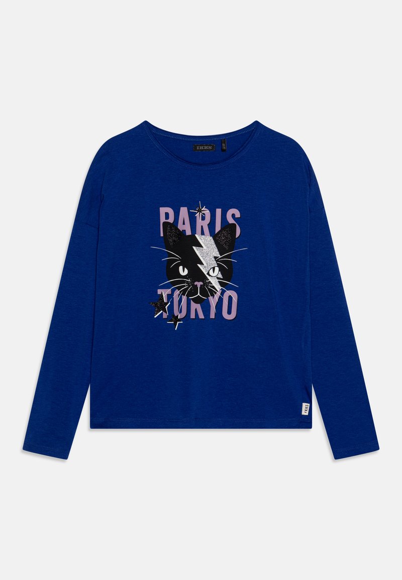 Long-sleeve blue t-shirt featuring a black cat graphic, pink text saying "PARIS TOKYO," and silver accents for added detail.
