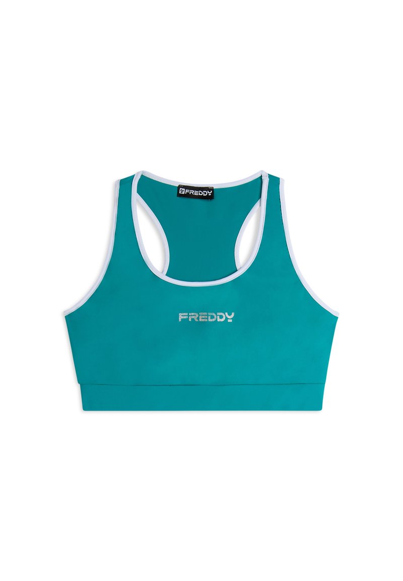Soutien-gorge de sport teal avec un design dos nageur. Il présente des bordures blanches et un logo argenté "FREDDY" centré sur le devant. Matériel lisse et extensible.