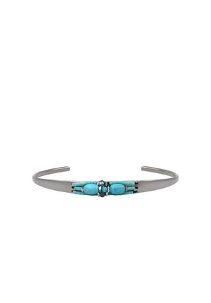 Bracelet manchette fin en argent avec pierres turquoise et petits accents de perles argentées au centre.