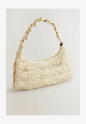 Woven cream handbag with a textured finish and a gold chain strap. Features a zip closure and a curved silhouette.