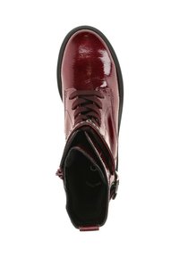 Burgundy patent leather ankle boots with a round toe, black sole, lace-up front, and side zipper closure. Smooth texture and glossy finish.