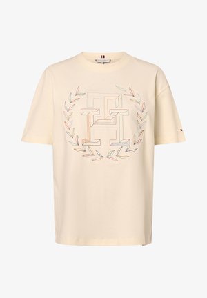 T-shirt beige manches courtes avec logo "TH" entrelacé brodé multicolore et motif de couronne de feuilles sur la poitrine.