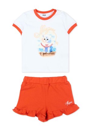 Maglietta bianca per bambina con bordatura arancione e stampa di gatto marinaio abbinata a pantaloncini arancioni con volant, vita elastica e ricamo del logo.