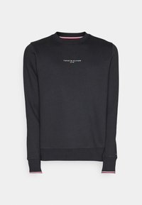 Felpa nera con maniche lunghe, polsini a coste e scollatura rotonda. Presenta il logo "Tommy Hilfiger" in bianco sul petto.